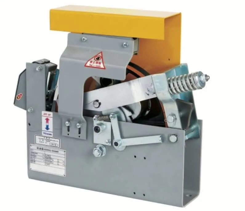 Centrifugal flyweight elevator speed governor with yellow rope guard, electrical trip switch and spring-loaded gripping jaw for machine-room mounting