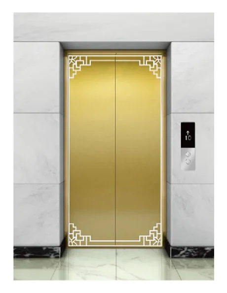 Gold titanium elevator landing door with etched geometric corner motifs and hairline centre panels, two-panel centre-opening set
