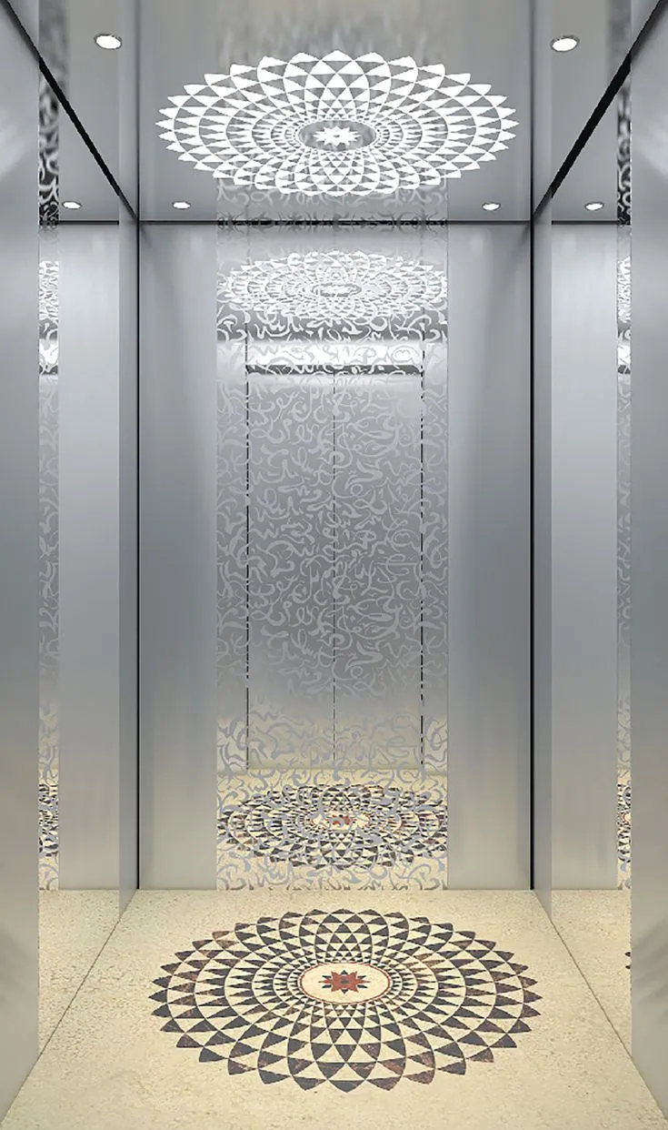 Mirror stainless steel elevator cabin with etched mandala ceiling and matching granite floor medallion, supplied in Karachi